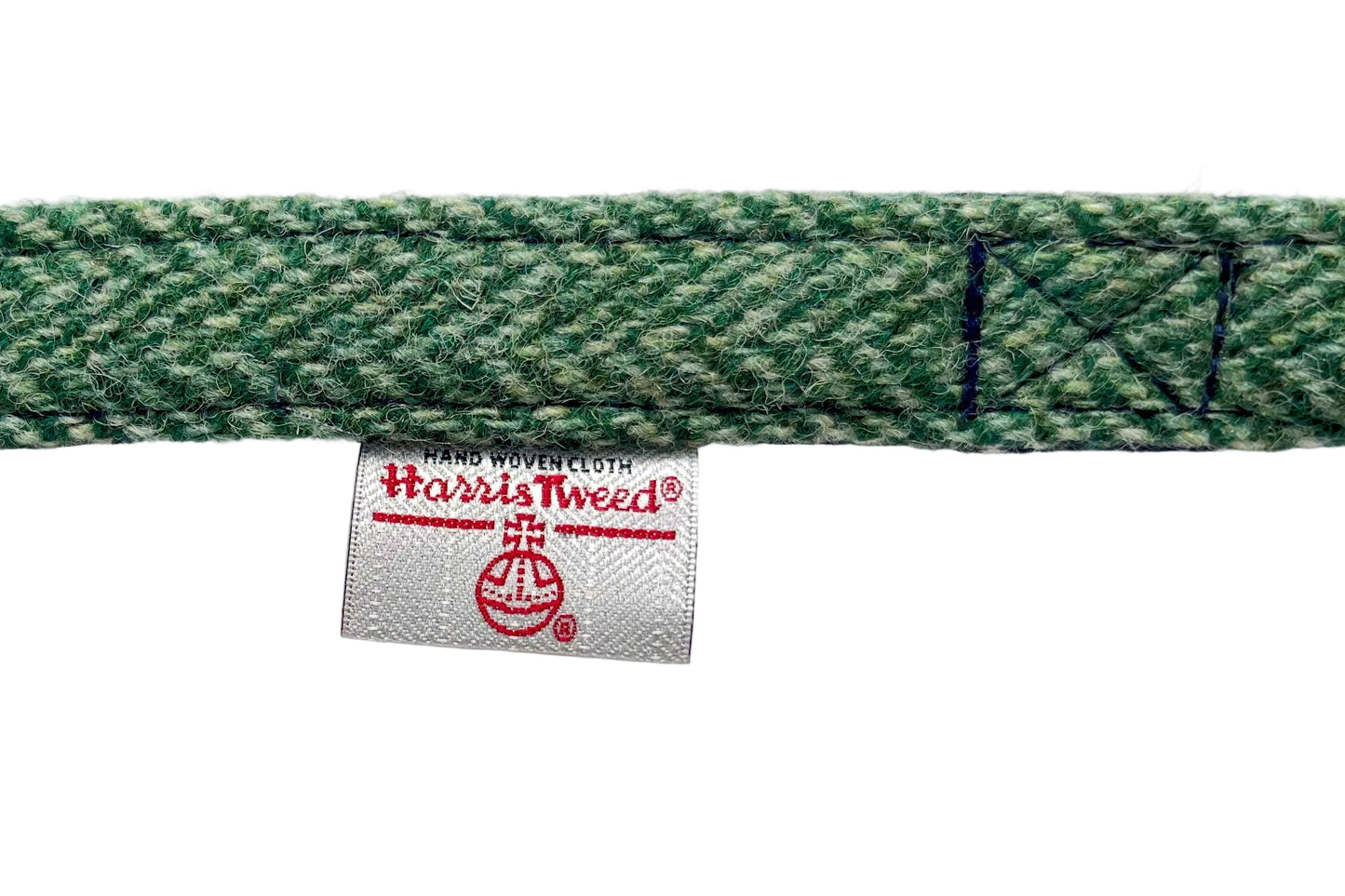 green Harris Tweed dog lead showing Harris Tweed Authority trademark label