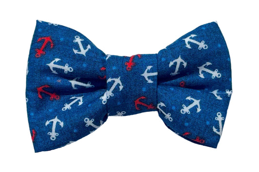 dog bowtie with anchors pattern on blue background. Lundy design by BlossomCo