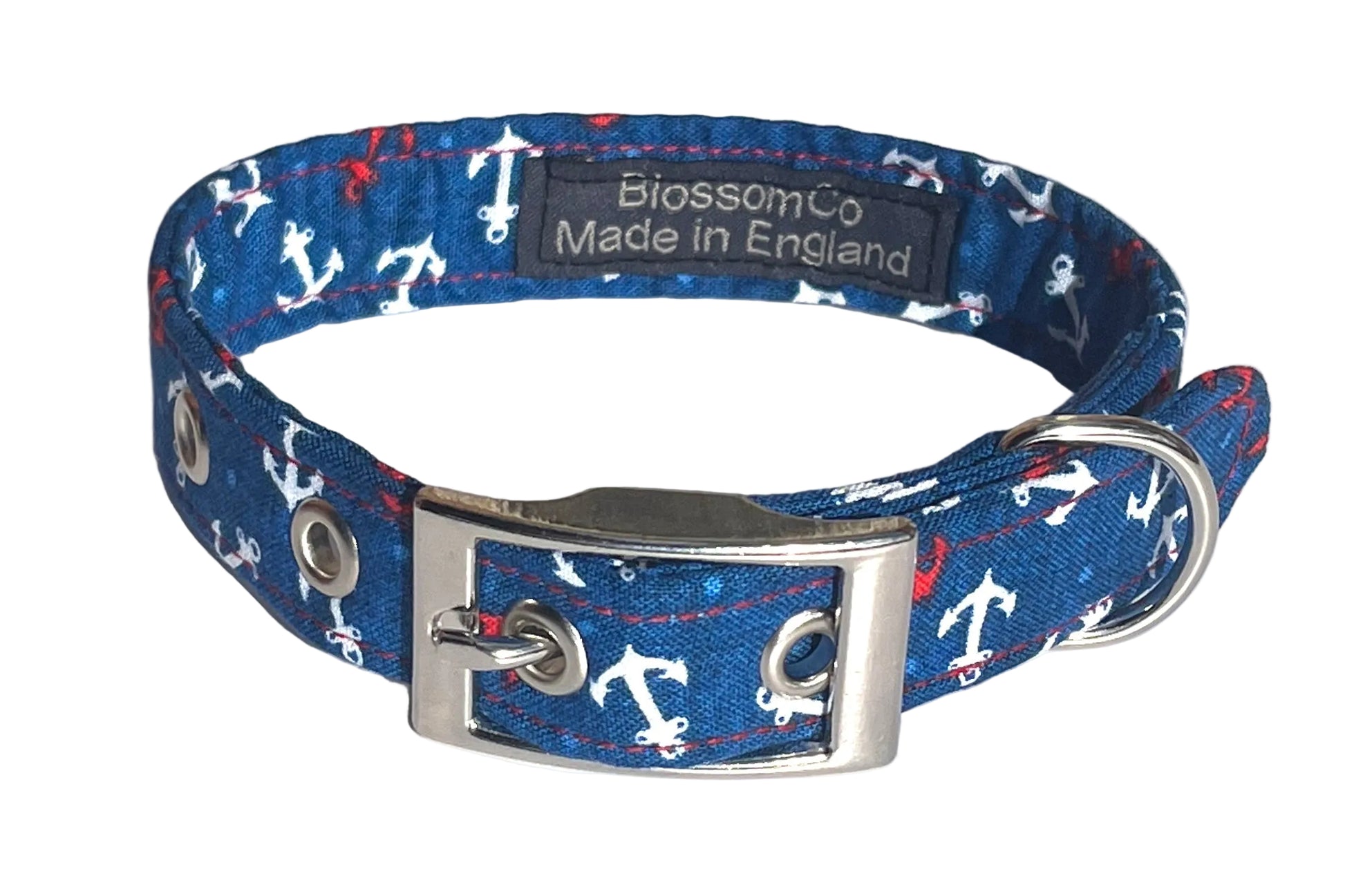 Seaside theme dog collar with pattern of anchors on a navy blue 
background