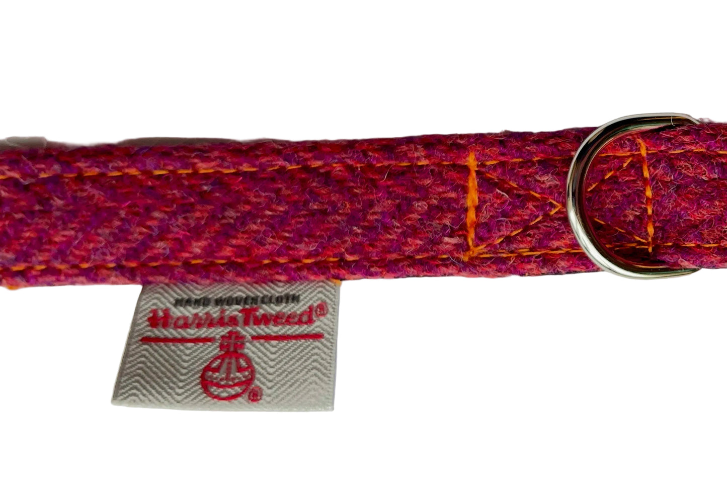 Deep Pink Harris Tweed dog collar with a metal buckle and Harris Tweed label on a white background